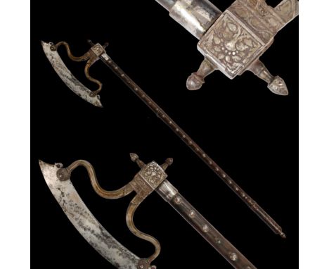 A RARE INDIAN BATTLE AXE, UDAIPUR, 18TH CENTURY. A rarely encountered form of Udaipur workmanship. The long, lightly-curved b