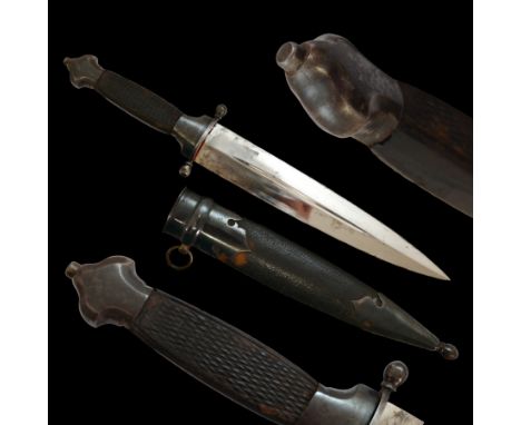 A rare Russian Zlatoust dagger, the hilt is a three-piece construction with a carved wooden hilt, a straight double-edged bla