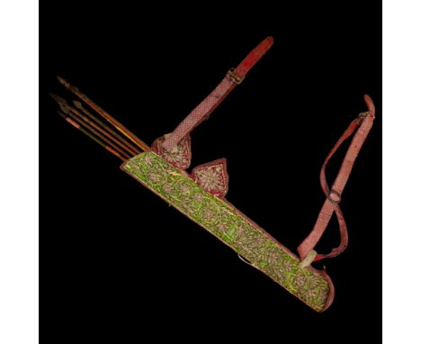 A MUGHAL QUIVER AND SIX ARROWS, 19TH CENTURY. Covered in green velvet and lavishly embroidered in silver, containing six arro