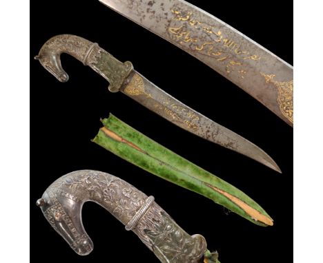 Magnificent Mughal Dagger with Wootz Blade, Jade and silver hilt , 18th C. The recurved, double-edged blade forged from wootz