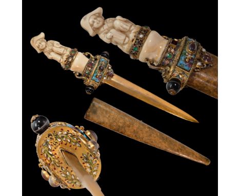 A unique Austrian dagger with a carved bone hilt decorated with gold, precious stones and enamel. Metal, straight, double-edg