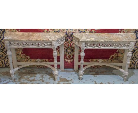 CONSOLE TABLES, a pair, French Louis XVI style traditionally grey painted each with marble top above a pierced frieze, bow si