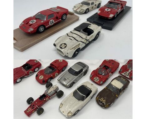 A mix of racing Ferraris and Fords. Models as follows:Ferrari 250 GTO in rare colours sporting the number 86 as driven by Pie