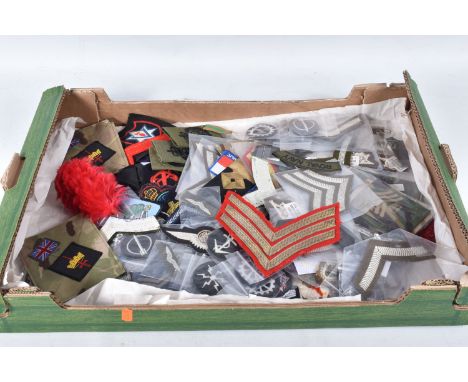 A LARGE QUANTITY OF ARMY RANK STRIPES and a small selection of Navy Cloth badges etc, the majority appear to be very modern a