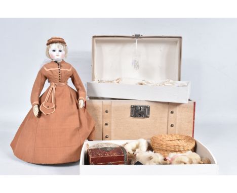 AN UNMARKED FRENCH FASHION DOLL, c.1870, Bisque shoulder head, Bru type face with some damage, fixed blue paperweight glass e