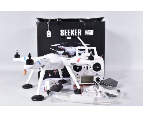 A BOXED WL TOYS/ZERO TECH QUADROCOPTER SEEKER, No.V303, not tested but understood to be in full working order, complete with 