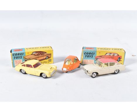 THREE BOXED CORGI TOYS CARS, Aston Martin DB4, No.218, primrose yellow body with cast criss-cross wheels, Heinkel Trojan Econ