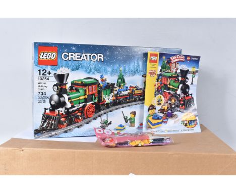 A FACTORY SEALED LEGO CREATOR WINTER HOLIDAY TRAIN, model no. 10254, 734 pieces, never opened with factory seal stickers no. 