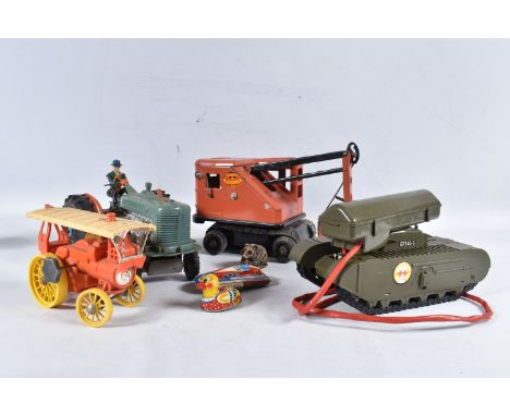 A QUANTITY OF ASSORTED UNBOXED TOYS, to include a Marx Heavy Duty Power Shovel, Minic plastic battery operated tank, not test