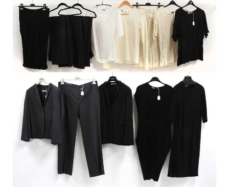 Jil Sander Clothing comprising a pewter grey wool trouser suit, with straight leg trousers, long sleeve jacket with single bu