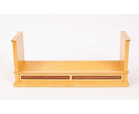 David Linley (born 1961) a book trough with inlaid burr wood panels, stamped 'Linley', 50.5cm wide x 21cm high and a letter b
