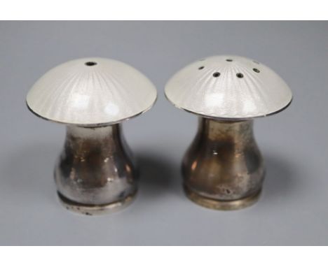 A pair of mid 20th century Danish sterling and enamel mushroom shaped condiments, by Egon Lauridsen, height 42mm.CONDITION: M