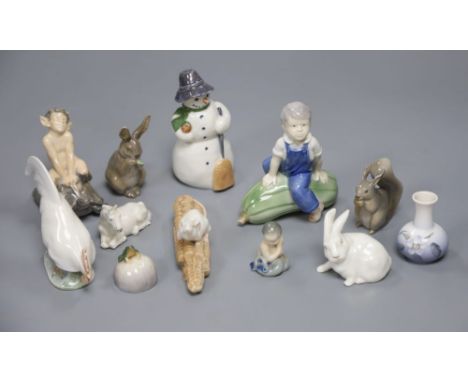 A collection of Royal Copenhagen including mice, chickens, rabbits, a snowman and a dish