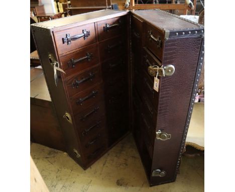 A Louis Vuitton style travel trunk, height 118cm
