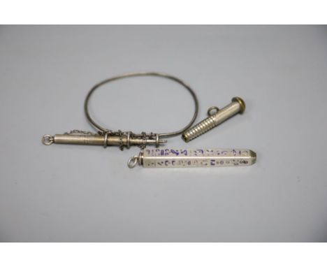 Two white metal pencils including enamel and a novelty pencil modelled as a screw, 4cm.