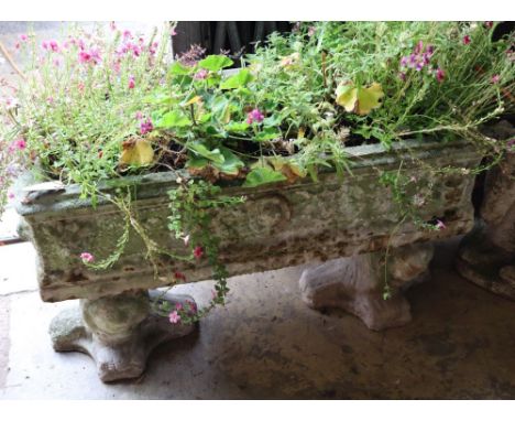 A reconstituted stone rectangular garden planter on trestle stand, length 92cm height 58cm