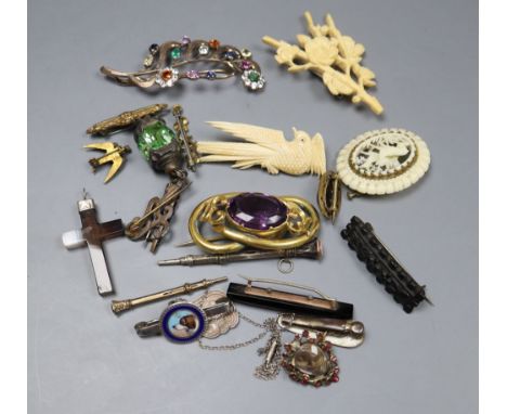 A small group of Victorian and later jewellery including a mourning brooch and silver and enamel dog brooch(converted).
