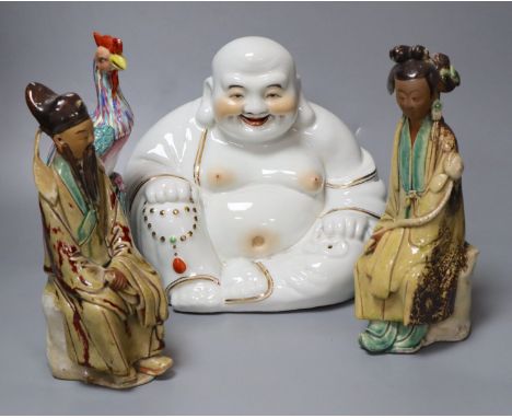 Four Chinese ceramic figures including Budai, 23cm, an enamelled phoenix, 24cm and two Chinese earthenware seated figuresCOND