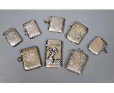 Eight silver vesta cases, including a 925 mermaid-embossed example with import marks, five foliate-engraved examples and one 