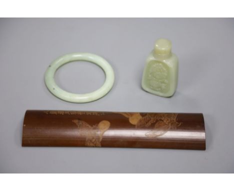 Two jade items and a bamboo tea scoop