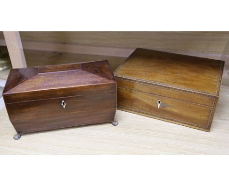An early 19th century mahogany sarcophagus shape tea caddy with gilt metal mounts, 32cm, and a 19th century writing / work bo