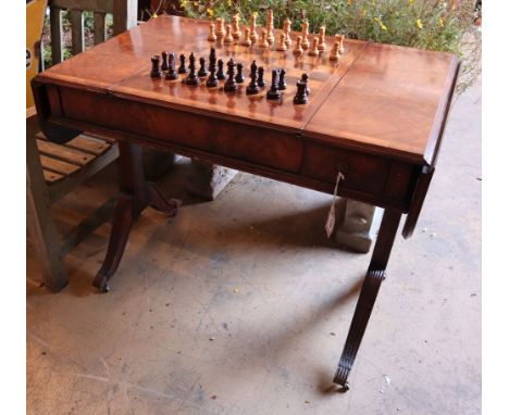 A George III style walnut sofa / games table with sliding reversible top, includes chess and backgammon pieces, width 94cm de