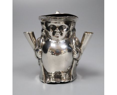 An Edwardian novelty silver mounted inkwell modelled as a Toby jug, London 1907, 68mm, weighted.CONDITION: Possible old repai