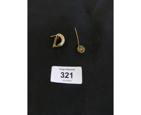 A selection of jewellery to include a stick pin and a single earring 