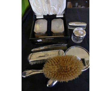 A mixed lot of silver-backed dressing table items, to include cased pair of brushes in the Art Deco style plus further brushe