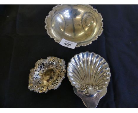 A mixed lot of silver wares comprising a small circular pedestal bonbon dish with decorated rim, together with a shell formed