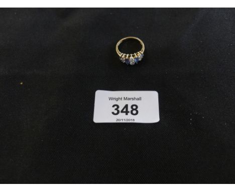 A 14ct gold blue topaz and cubic zirconia dress ringRing size K, weight approx. 2.6g. 