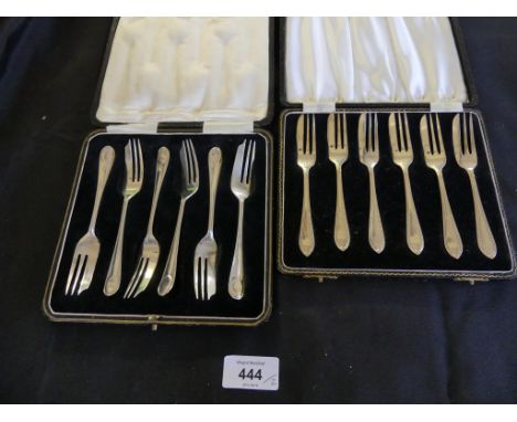 Two cases of six Sheffield hallmarked silver cake forks, approx. 6.4oz 