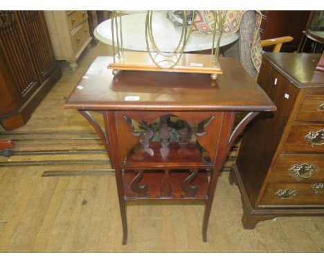 A late 19th Century mahogany occasional table with a base shelf 