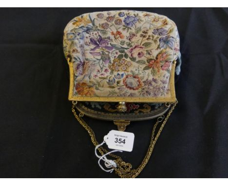 Two tapestry handbagsEach with a tapestry body, engraved clasp and chain handle. 