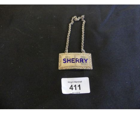 A silver and blue enamel decanter label marked 'Sherry' bearing Birmingham hallmarks 