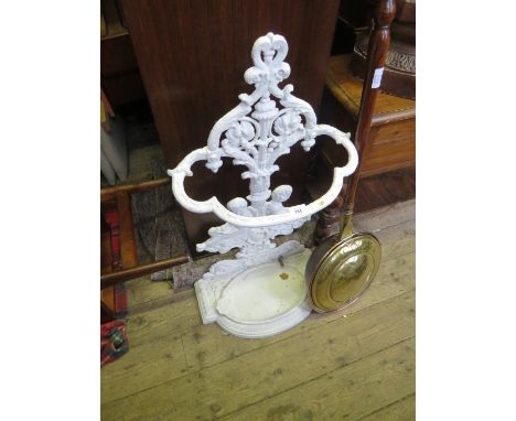 A white painted cast iron umbrella/stick stand, with cherub decoration 
