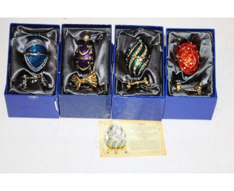 Four boxed Atlas Faberge style egg trinket boxes 