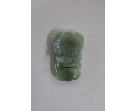 A Chinese jade buckle 7.5cm long 