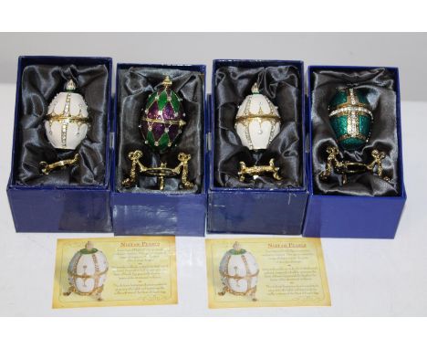 Four boxed Atlas Faberge style egg trinket boxes 