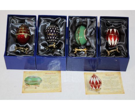 Four boxed Atlas Faberge style egg trinket boxes 
