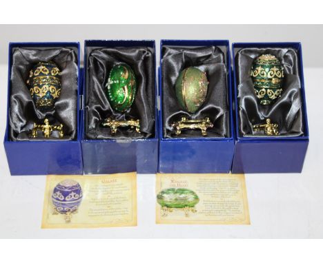 Four boxed Atlas Faberge style egg trinket boxes 