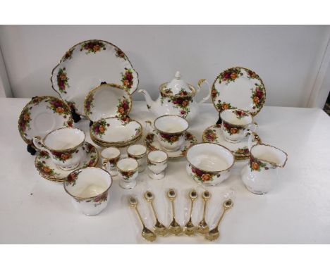 A Royal Albert 24 piece tea service and 6 teaspoons 