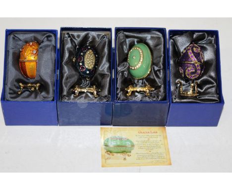 Four boxed Atlas Faberge style egg trinket boxes 