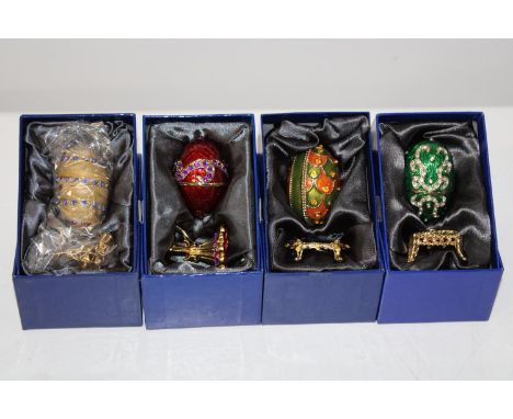 Four boxed Atlas Faberge style egg trinket boxes 