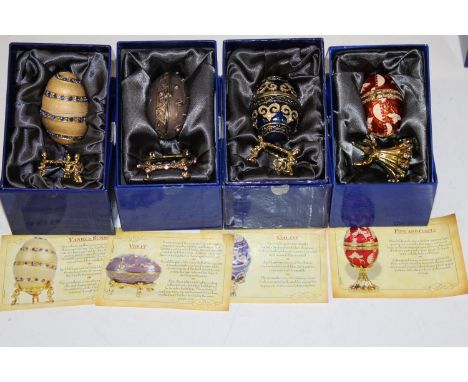 Four boxed Atlas Faberge style egg trinket boxes 