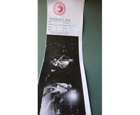 An unframed Nirvana photographic print from the Burning Wolf press 