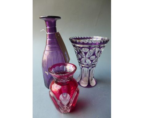 Two antique cut glass vases (one af) and a purple cut glass decanter