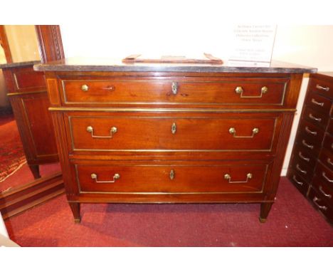 A 19th century French mahogany commode chest, the veined marble top above three drawers with gilt metal fittings on tapering 