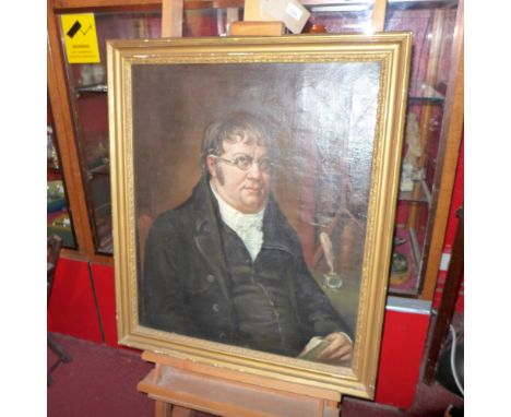A Victorian oil on canvas portrait of a Scholarly Gentleman wearing glasses, in a gilt frame 