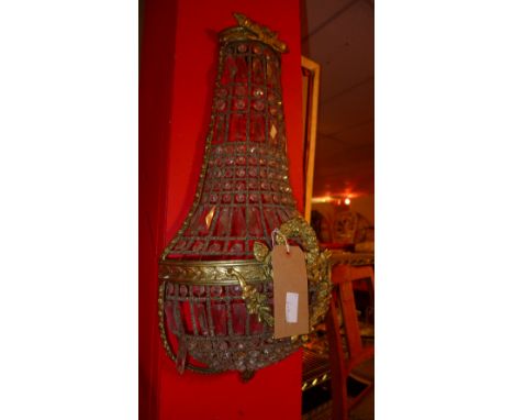 A gilt metal and cut glass basket form wall light